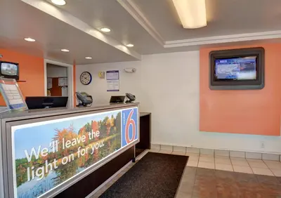 a waiting room at aight leave the light on top at Motel 6-Chicopee, MA - Springfield in Chicopee