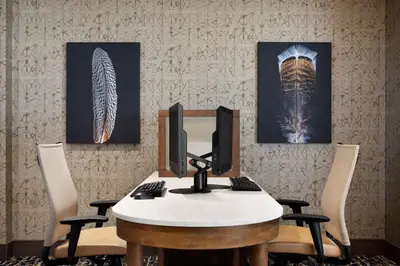 an office with a desk with a computer on it at Tru by Hilton Albany Crossgates Mall in Albany