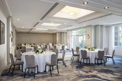 a banquet room with white tables and chairs at Hyatt Regency Greenwich in Greenwich