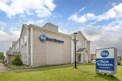 a building with a buy best western sign in front of it at Best Western Cooperstown in Cooperstown