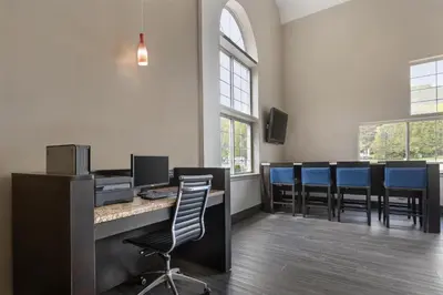 an office with a bar with blue chairs at Best Western Cooperstown in Cooperstown