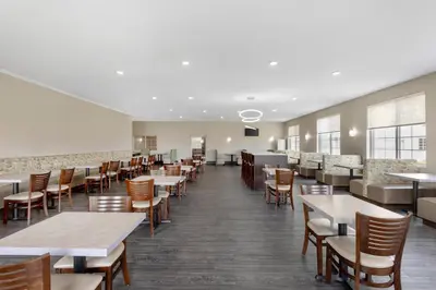 a dining room with tables and chairs at Best Western Cooperstown in Cooperstown