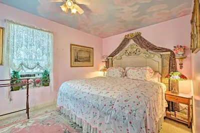 a bedroom with a bed and a ceiling at Beds on Clouds in Windham