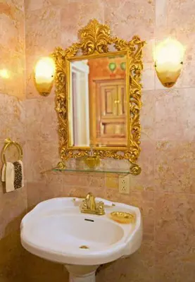 a bathroom with a sink and a mirror on the wall at Beds on Clouds in Windham