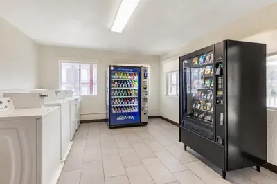 a store with two refrigerators in a room at Red Roof Inn Stroudsburg in Stroudsburg
