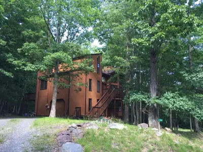 a house in the middle of the forest at Big House On The Hill in East Stroudsburg