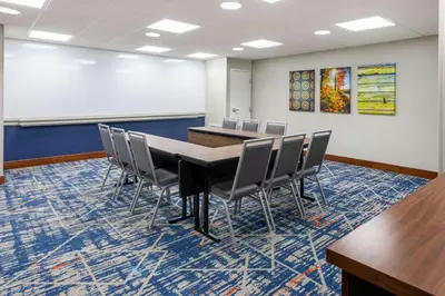 a conference room with a table and chairs at Hampton Inn Harriman Woodbury in Central Valley