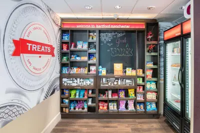 a food store with a shelf of food at Hampton Inn & Suites Hartford-Manchester in Manchester