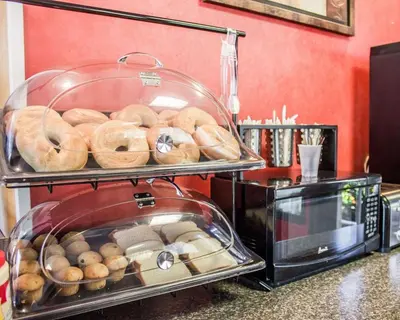 a bunch of donuts are on a display at Rodeway Inn Huntington Station - Melville in Huntington