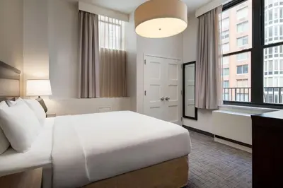 a hotel room with a bed and a window at Residence Inn by Marriott New York Manhattan/ Midtown Eastside in New York