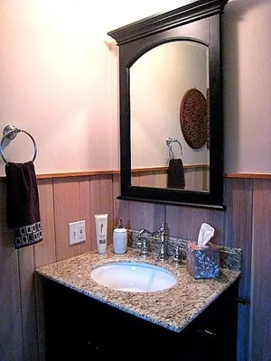 a bathroom with a sink and a mirror at The Catskill Cabin in Elka Park