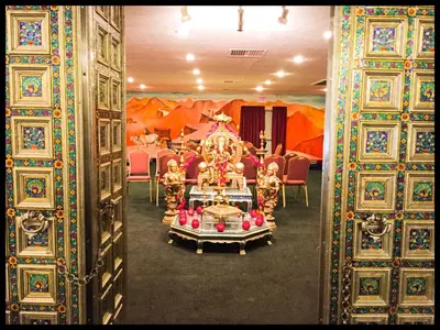 a room with a altar in a room with chairs at Days Inn by Wyndham Tannersville in Tannersville