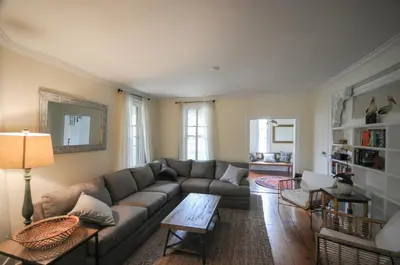 a living room with a couch and a table at The Gables of Rhinebeck in Rhinebeck