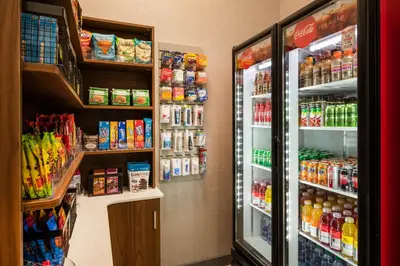 a store with two refrigerators in a grocery store at Wingate by Wyndham Long Island City in Queens