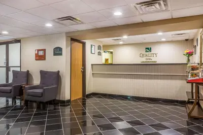 a waiting room at a clinic with two chairs at Quality Inn Hyde Park - Poughkeepsie North in Hyde Park
