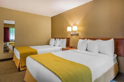 a hotel room with two beds in a room at Quality Inn Hyde Park - Poughkeepsie North in Hyde Park