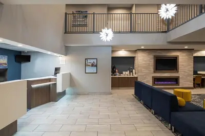 a lobby of a hospital with a waiting room at Baymont by Wyndham White Plains - Elmsford in Elmsford