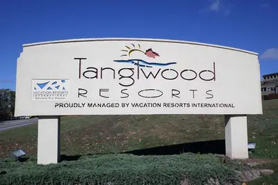 a sign for the tangwood resorts resort at Tanglwood Resort in Hawley