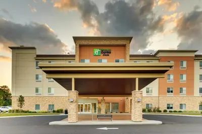 a hotel with a sign on the front of it at Holiday Inn Express & Suites - Saugerties - Hudson Valley by IHG in Saugerties