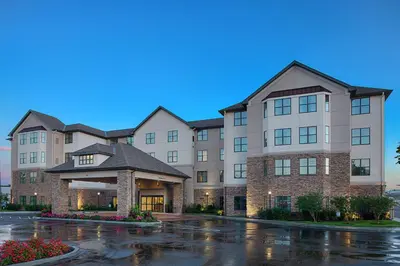 a rendering of the front of a hotel at Homewood Suites by Hilton Carle Place - Garden City, NY in Carle Place