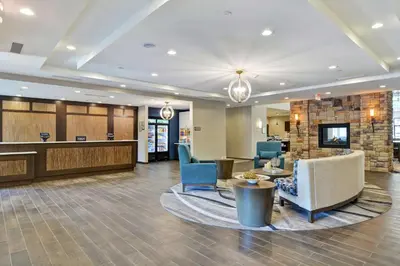 a lobby of a hospital with chairs and a waiting room at Homewood Suites By Hilton Poughkeepsie in Poughkeepsie