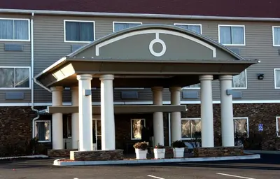 a building with a gazebo with a clock on it at Holiday Inn Express - Ludlow - Chicopee Area by IHG in Ludlow