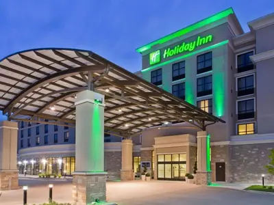 a hospital building with a healthcare inn sign on it at Holiday Inn Cheshire - Southington by IHG in Southington