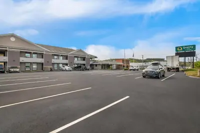 a parking lot in front of a hotel at Quality Inn Waterbury East in Waterbury
