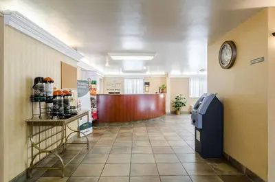 a hallway of a hospital with a waiting room at Quality Inn Chicopee-Springfield in Chicopee