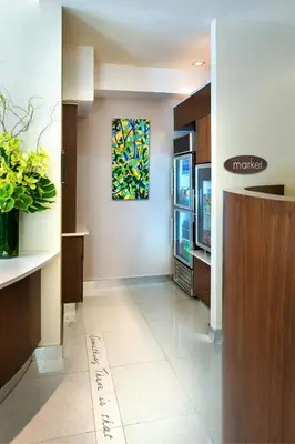 a lobby of a hospital with a window on the wall at SpringHill Suites by Marriott New York Midtown Manhattan/Fifth Avenue in New York