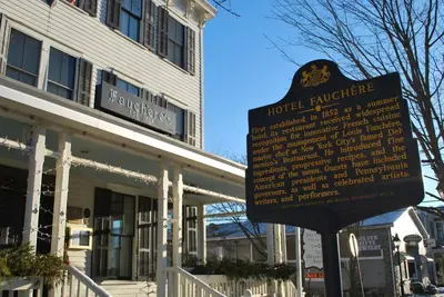 a sign in front of a building at Hotel Fauchere in Milford