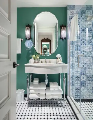 a bathroom with a sink and a mirror at Graduate by Hilton New Haven in New Haven