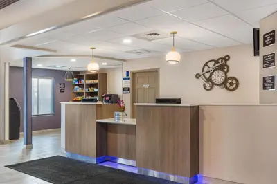 a lobby of a hospital with a reception desk at Best Western Manchester in Manchester