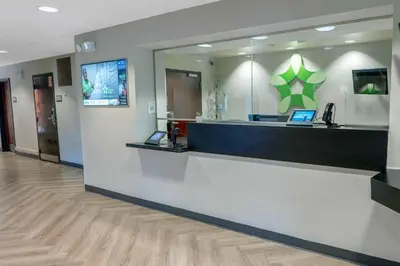 a lobby with a cash counter in a hospital at Extended Stay America Suites - Hartford - Farmington in Farmington