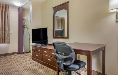 a room with a desk with a chair and a television at Extended Stay America Suites - Mt Olive - Budd Lake in Budd Lake