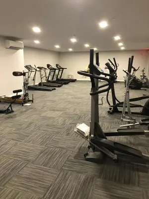 a gym with rows of exercise bikes in a room at Allen Lake Resort Richfield Springs Cooperstown in Richfield Springs