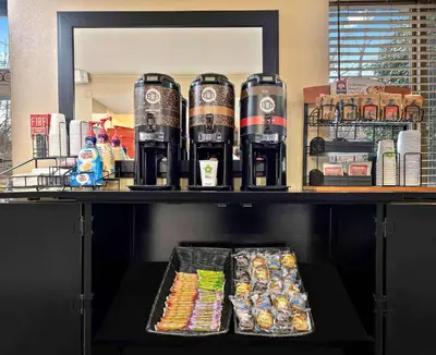 a shelf with drinks and snacks on it at Extended Stay America Suites - Hanover - Parsippany in Whippany