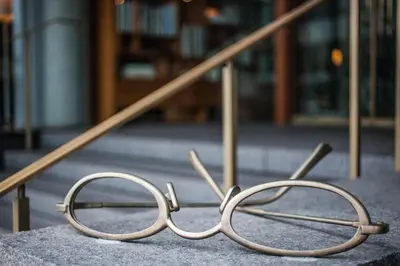 a pair of glasses sitting on the ground at The Study at Yale, Study Hotels in New Haven