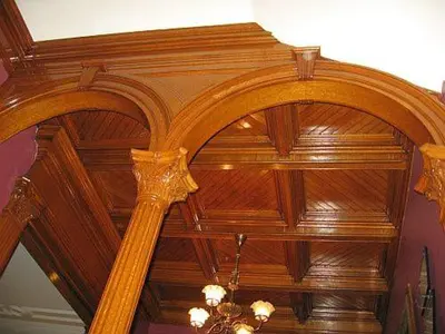 a wooden ceiling with a chandelier in a room at Olde Judge Mansion B&B in Troy