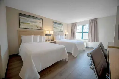 a hotel room with two beds and a window at Extended Stay America Suites - Shelton - Fairfield County in Shelton
