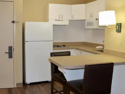 a kitchen with white appliances and a white refrigerator at Extended Stay America Suites - Shelton - Fairfield County in Shelton