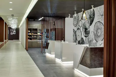 a hallway of a store with white counters at Residence Inn by Marriott Albany Airport in Albany