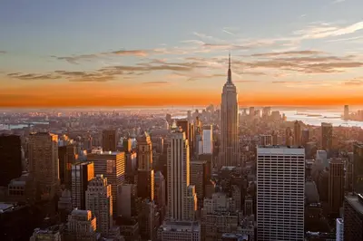 a view of the skyscrapers of a city at sunset at Fairfield Inn & Suites New York Manhattan/Downtown East in New York