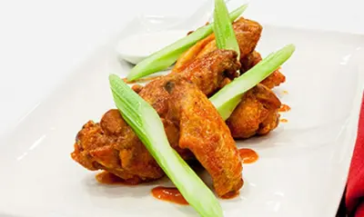 a plate of food with chicken and vegetables on it at DoubleTree by Hilton Hotel Bristol in Bristol