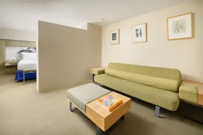 a living room with a couch and a table at The Shoreham in New York