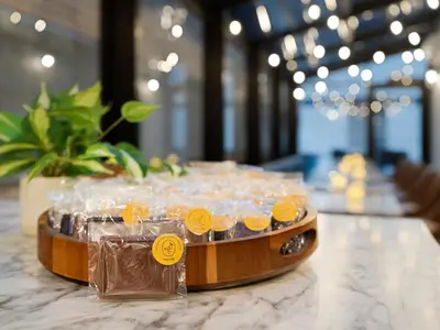a tray of cupcakes on top of a table at voco The Franklin New York by IHG in New York