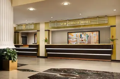a lobby of a new yorker hotel at New Yorker by Lotte Hotels in New York