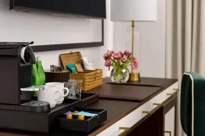 a room with a counter with a coffee maker at The Chemists Club Hotel in New York