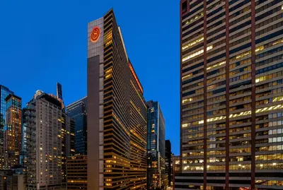 a group of tall buildings in a city at night at Sheraton New York Times Square Hotel in New York