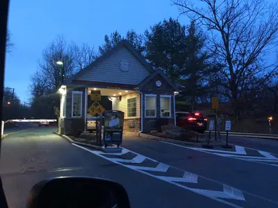 a small house on the side of a street at Cozy Cottage at Saw Creek in Bushkill